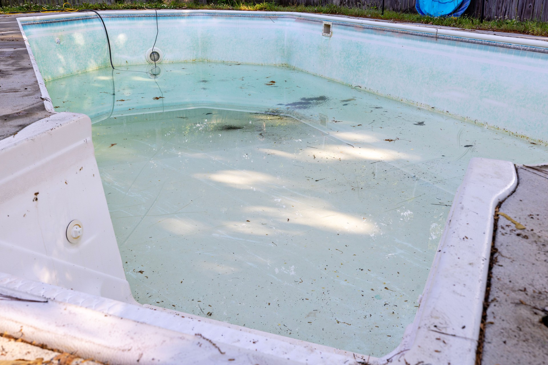 Water removal from pool in preparation for new pool liner